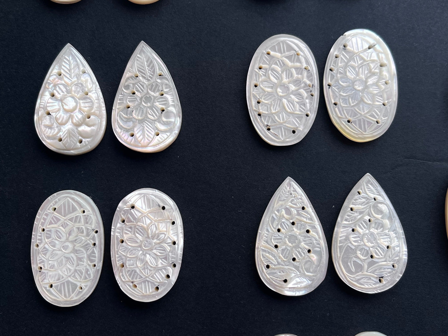 Natural Mother of Pearl Carved Pair