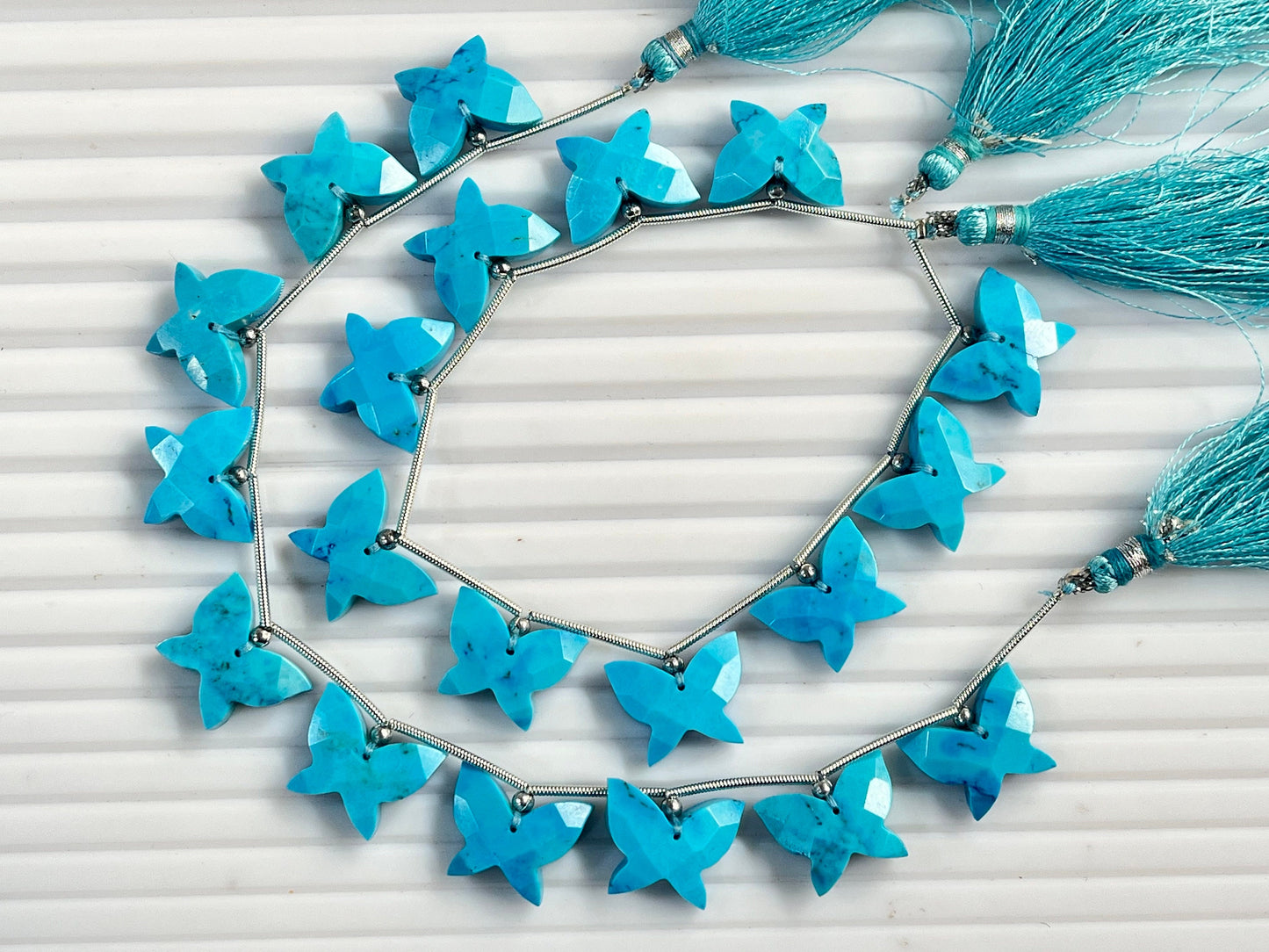 Turquoise Carved faceted butterfly shape beads