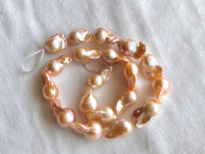 16 Inch Natural Cultured Freshwater Lustrous Peachy Pink Baroque Pearls