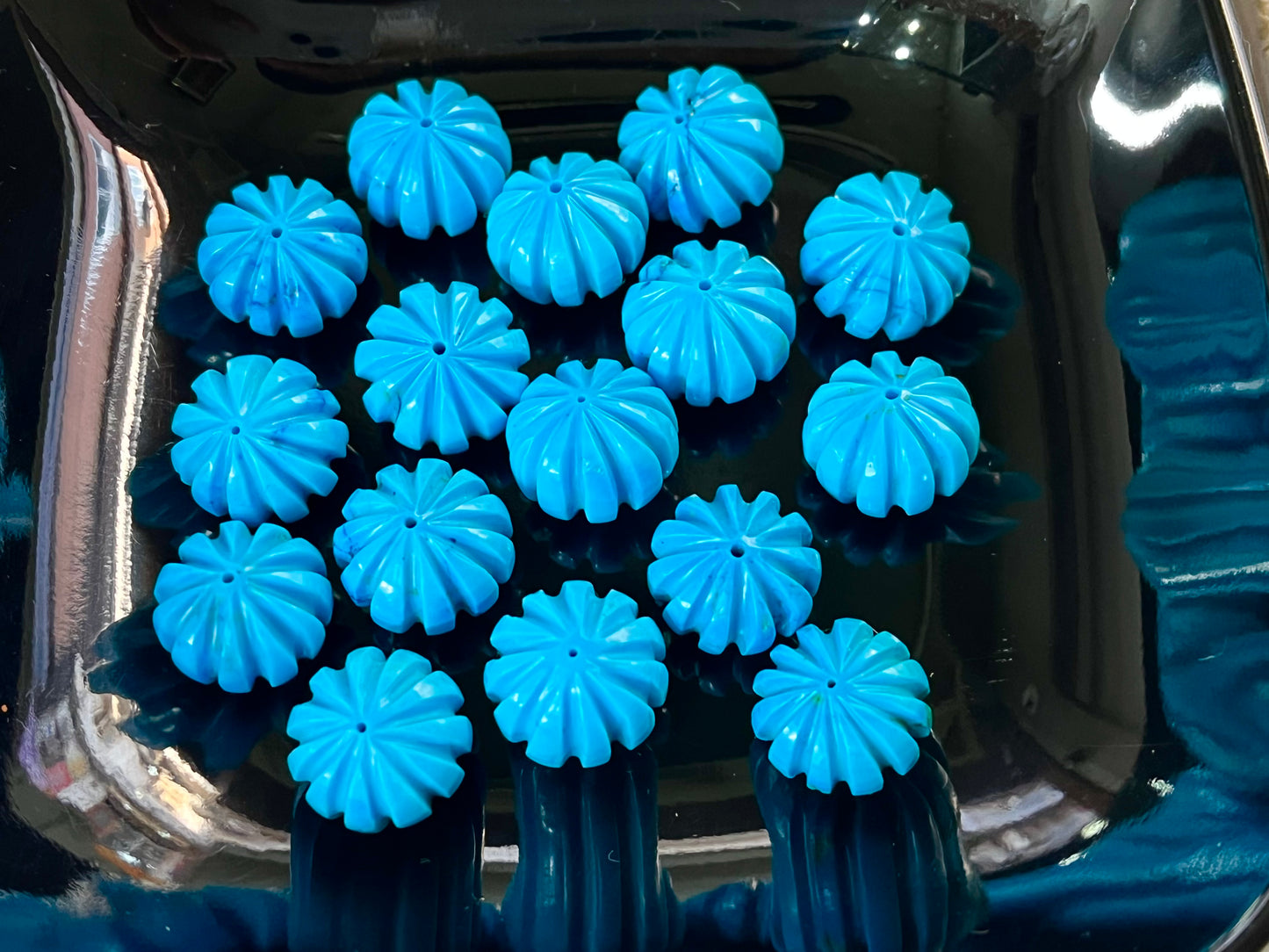 Turquoise hand carved melons loose