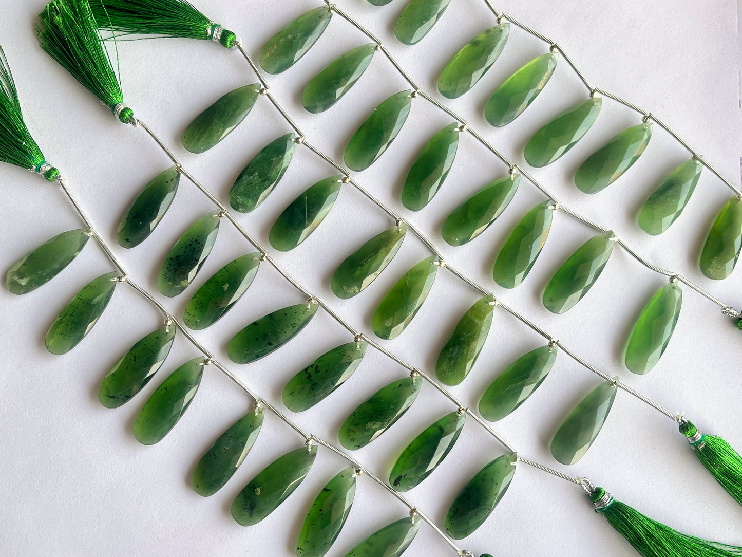 Serpentine faceted pear briolette beads