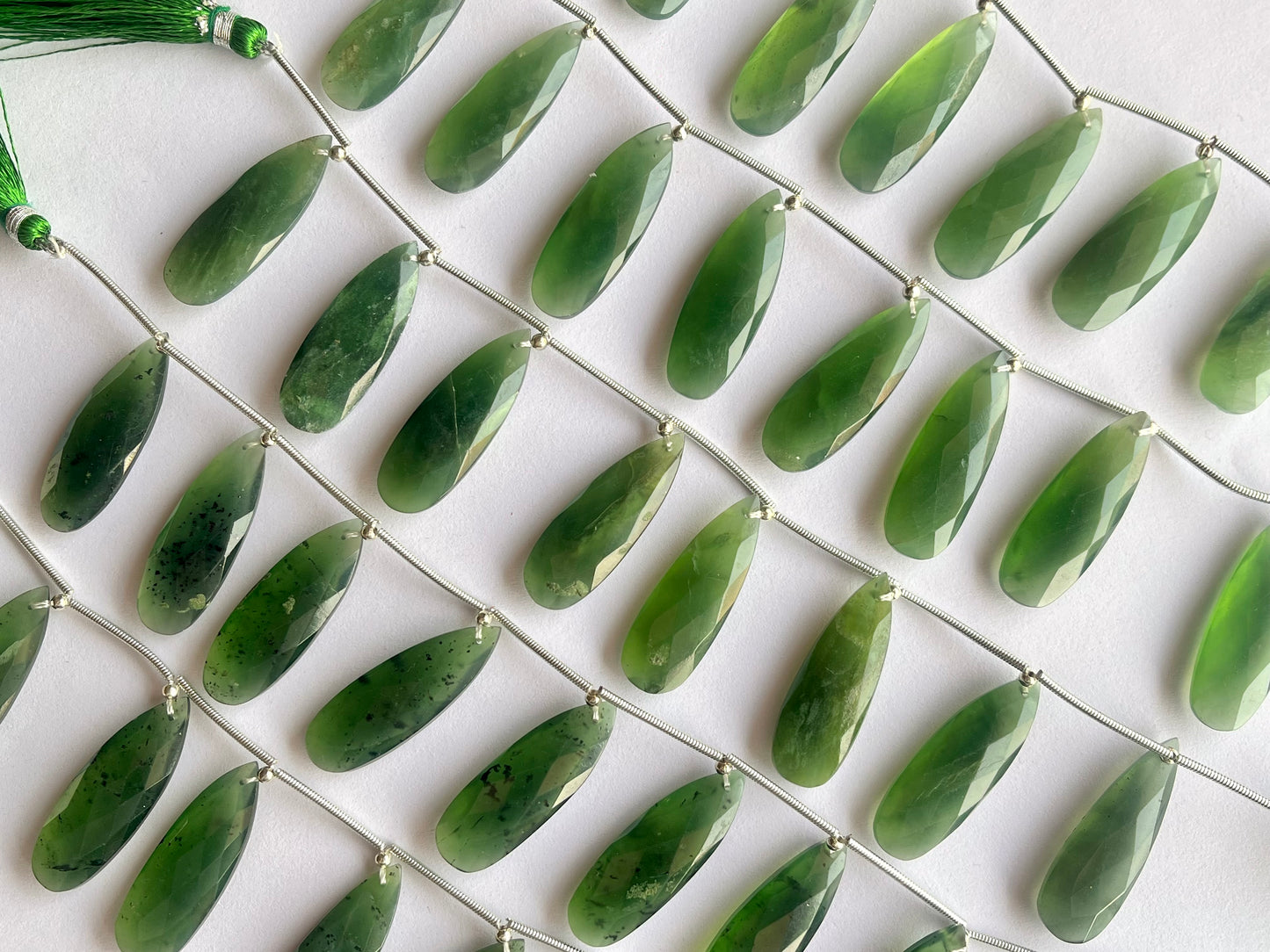 Serpentine faceted pear briolette beads