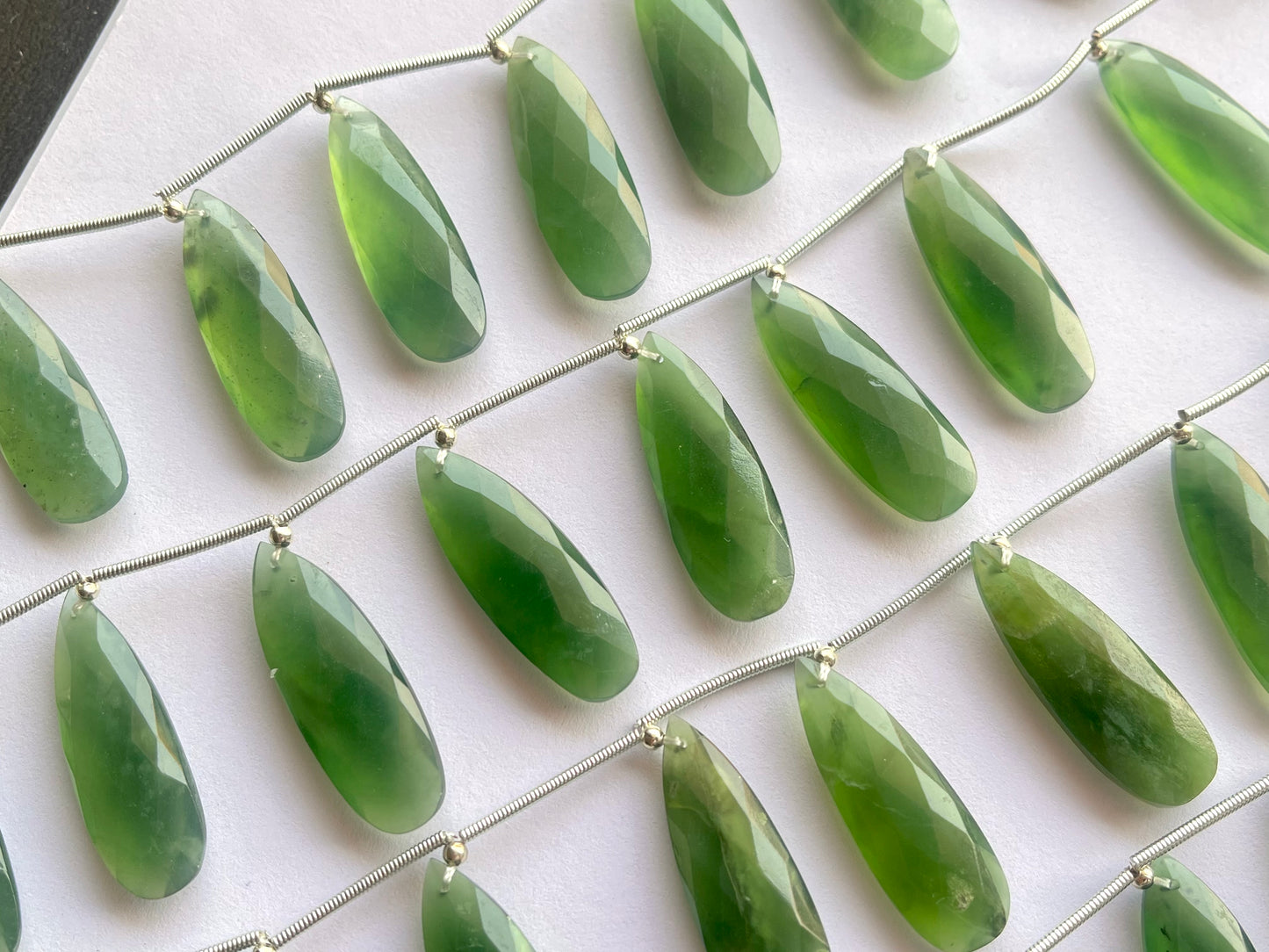 Serpentine faceted pear briolette beads