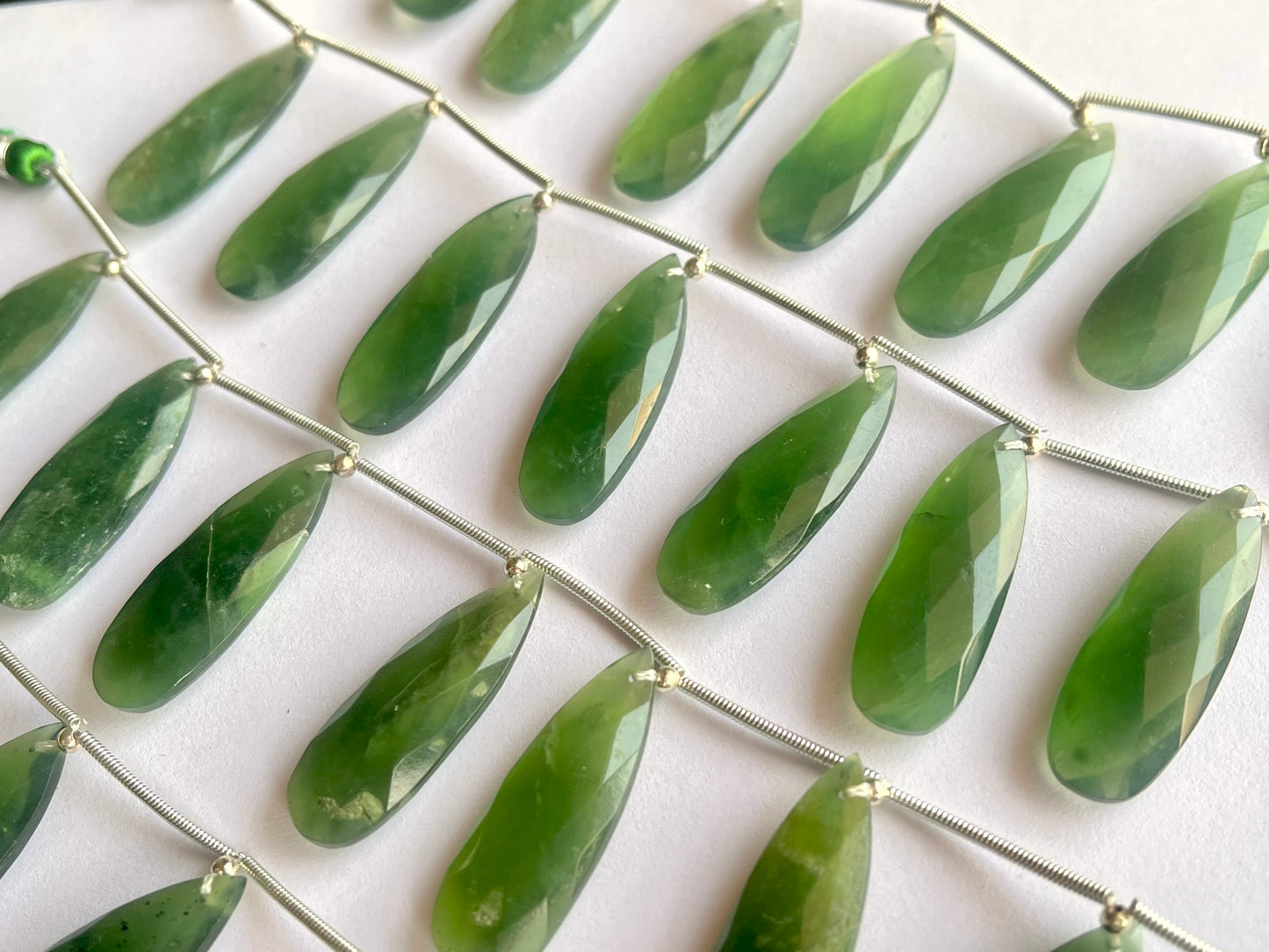 Serpentine faceted pear briolette beads