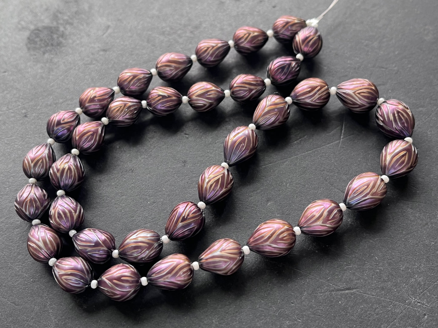 Tahitian Natural Freshwater Pearl Drop shape Hand-Carved Strand