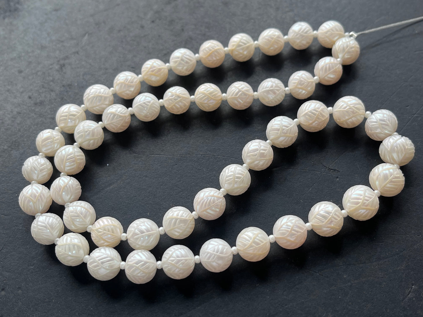 White Natural Freshwater Pearl Spherical shape Hand-Carved Strand