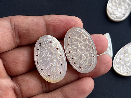 Natural Mother of Pearl Carved Pair