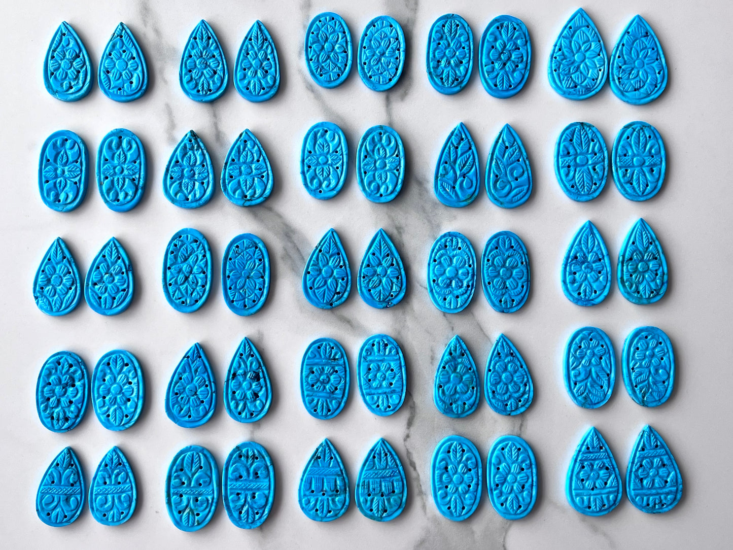 Natural Turquoise  Carved Pair