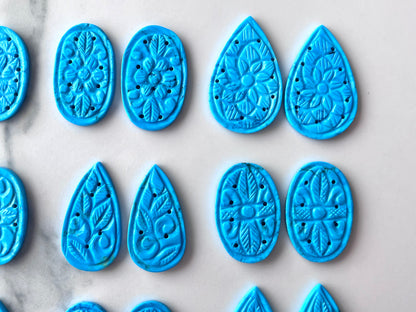 Natural Turquoise  Carved Pair
